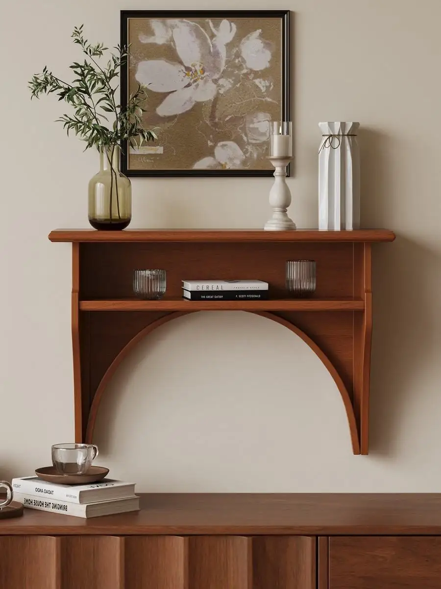 arched wall-mounted display console shown in a second interior setting