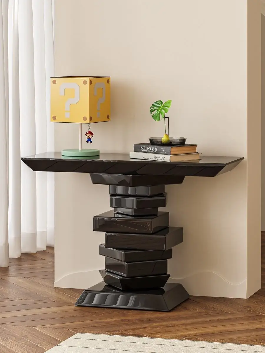 Alternate room view of the sculptural stacked-volume console table