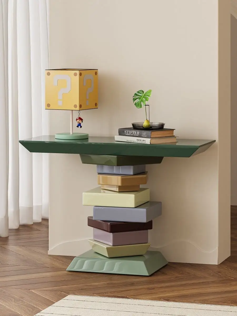 Closer product view of the sculptural stacked-volume console table
