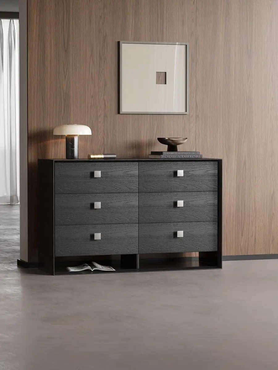 charcoal timber six-drawer dresser shown with surrounding furniture for scale