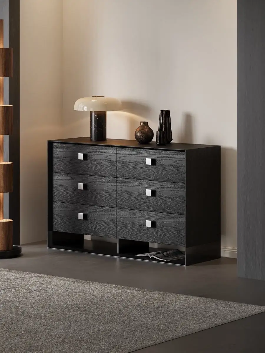 Final lifestyle view of the charcoal timber six-drawer dresser