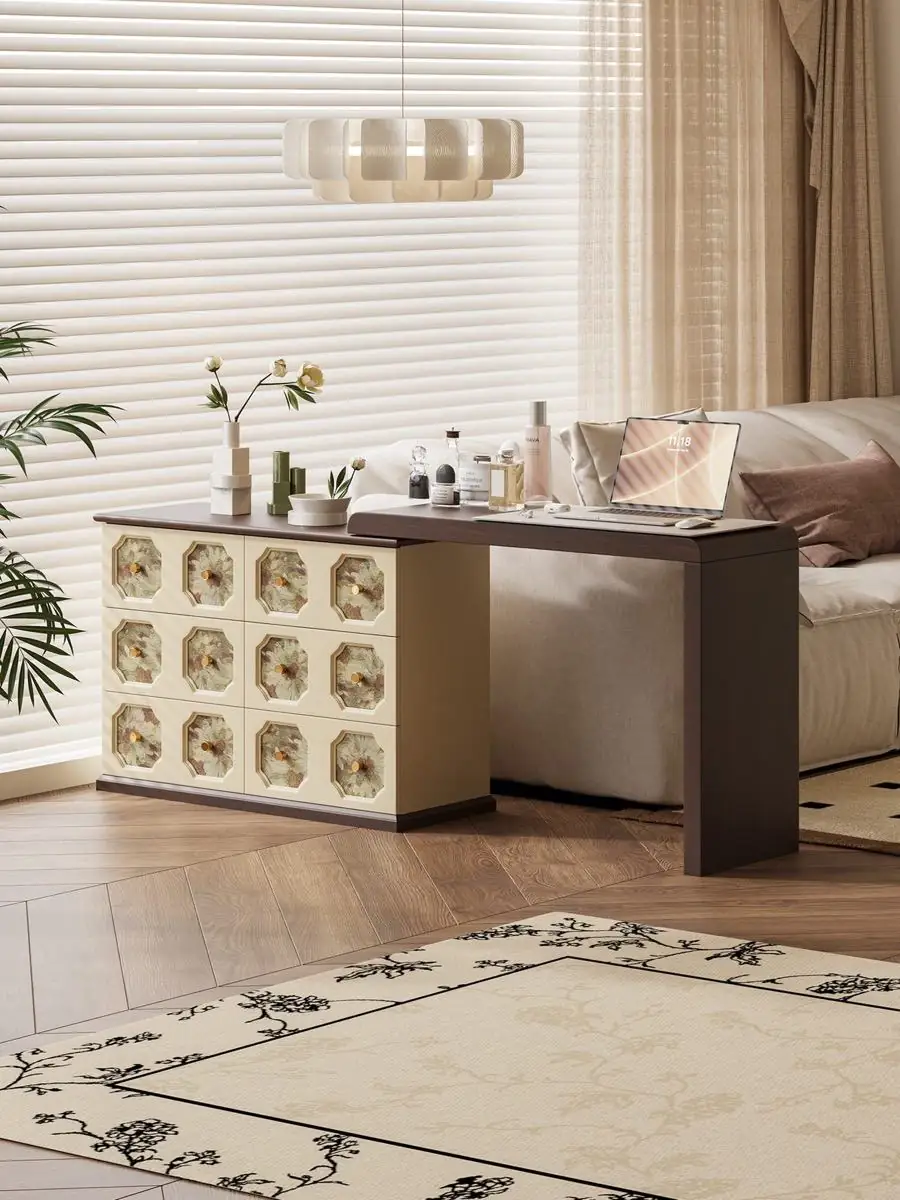 Front view of the botanical drawer fronts and dark frame