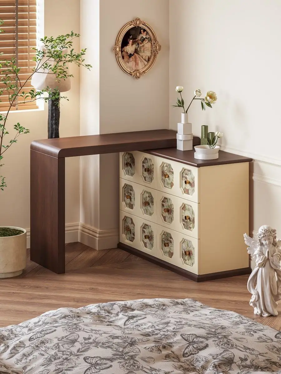Decorative print and warm metal hardware detail