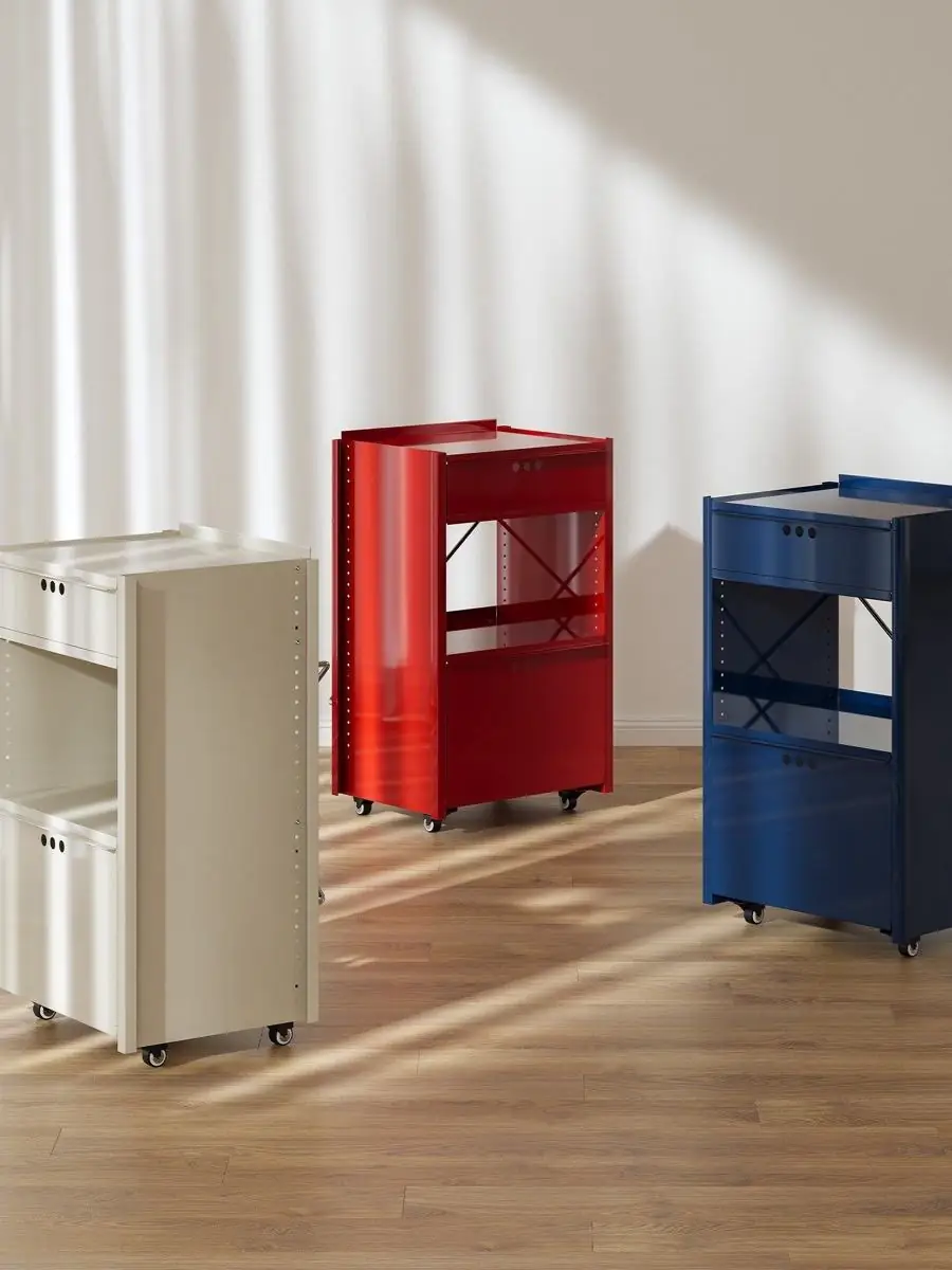 colour-led mobile metal utility cabinet shown with surrounding furniture for scale