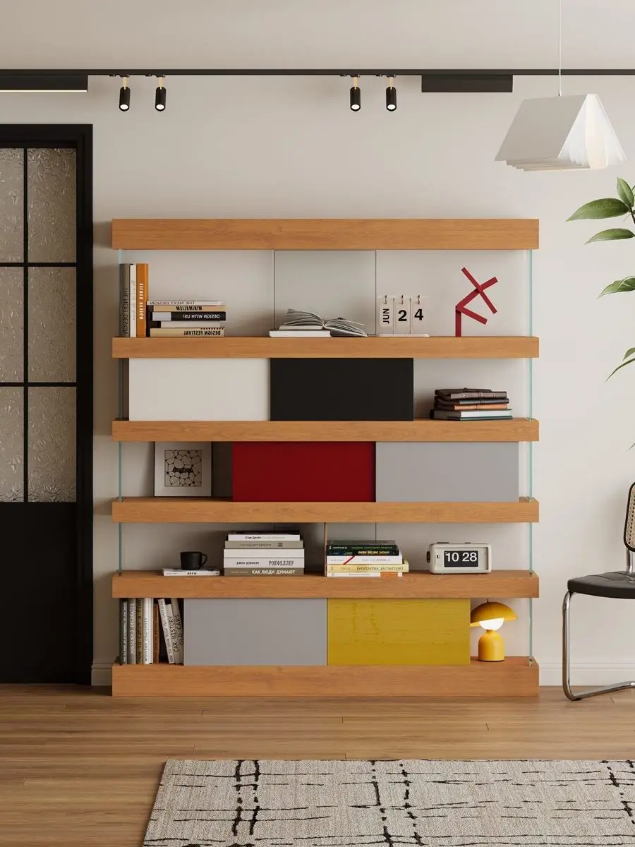 Room-scale composition showing the shelving as an interior boundary