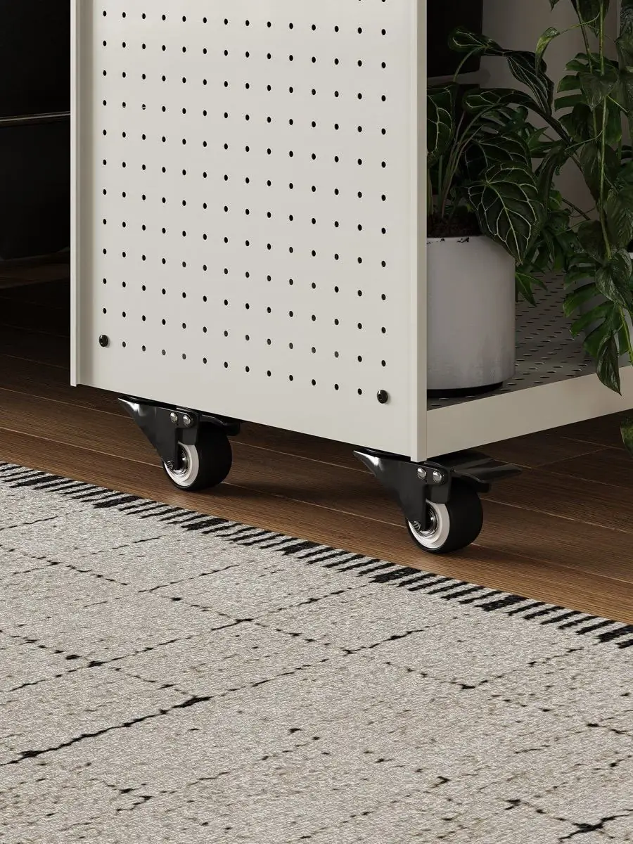 Perforated metal shelf detail on the mobile plant trolley