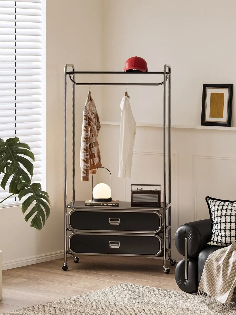 Alternate room view of the mobile tubular garment rack with drawers