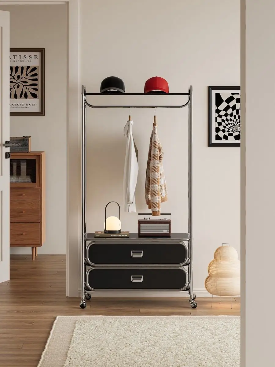 Material and form study of the mobile tubular garment rack with drawers