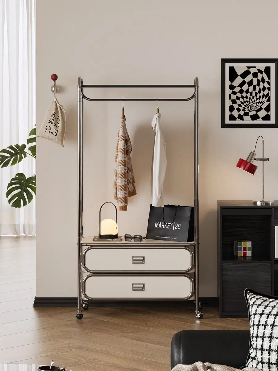 Final lifestyle view of the mobile tubular garment rack with drawers