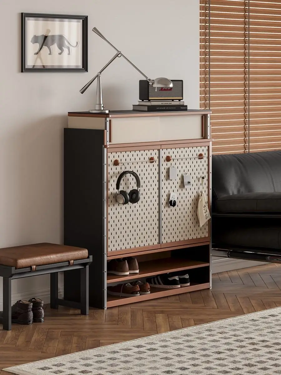 Front view of the perforated double-door shoe cabinet
