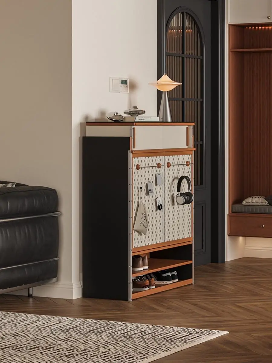 Shoe cabinet staged in a bright entryway