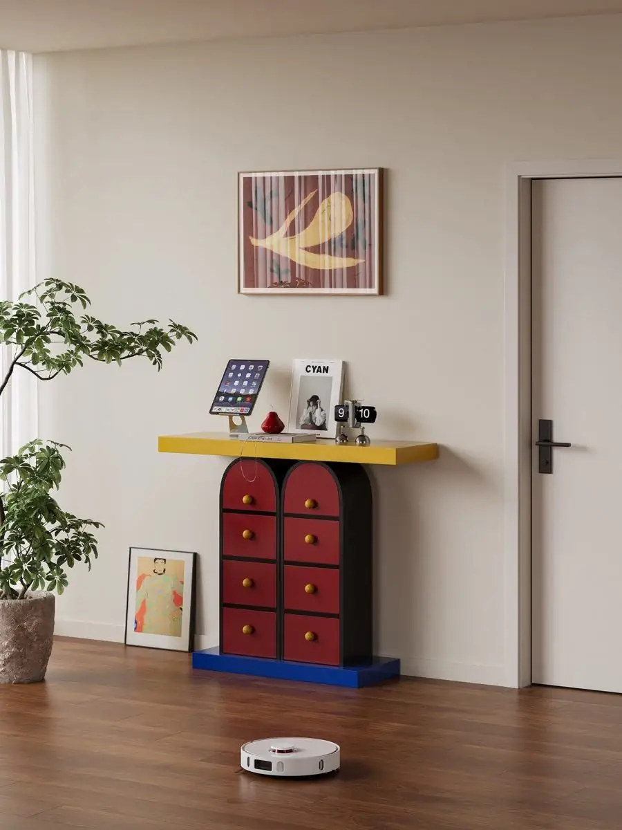 Final lifestyle view of the Memphis-style multicolour drawer console
