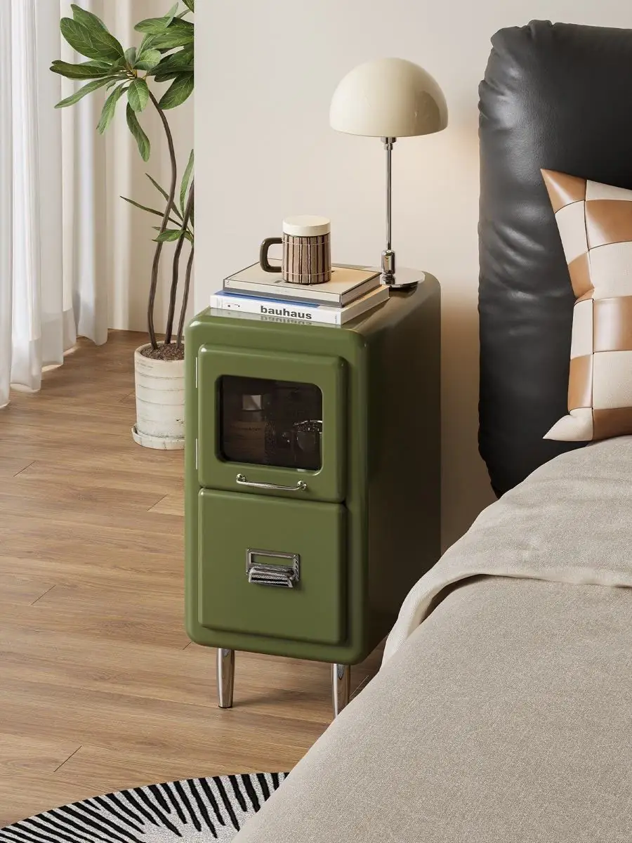 slim retro-industrial bedside cabinet shown with surrounding furniture for scale