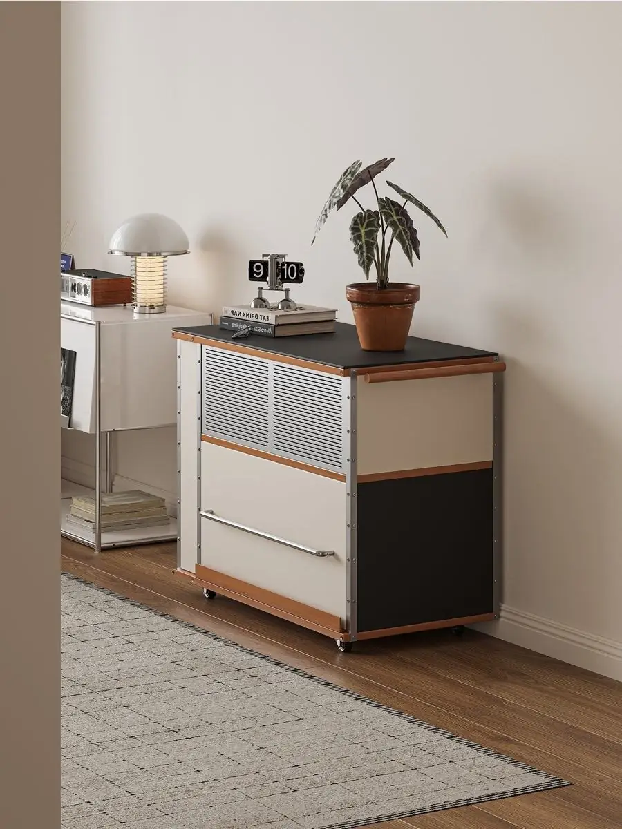 Perforated storage front and walnut worktop detail