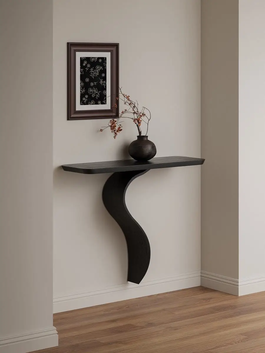 sculptural S-curve floating wall console shown with surrounding furniture for scale