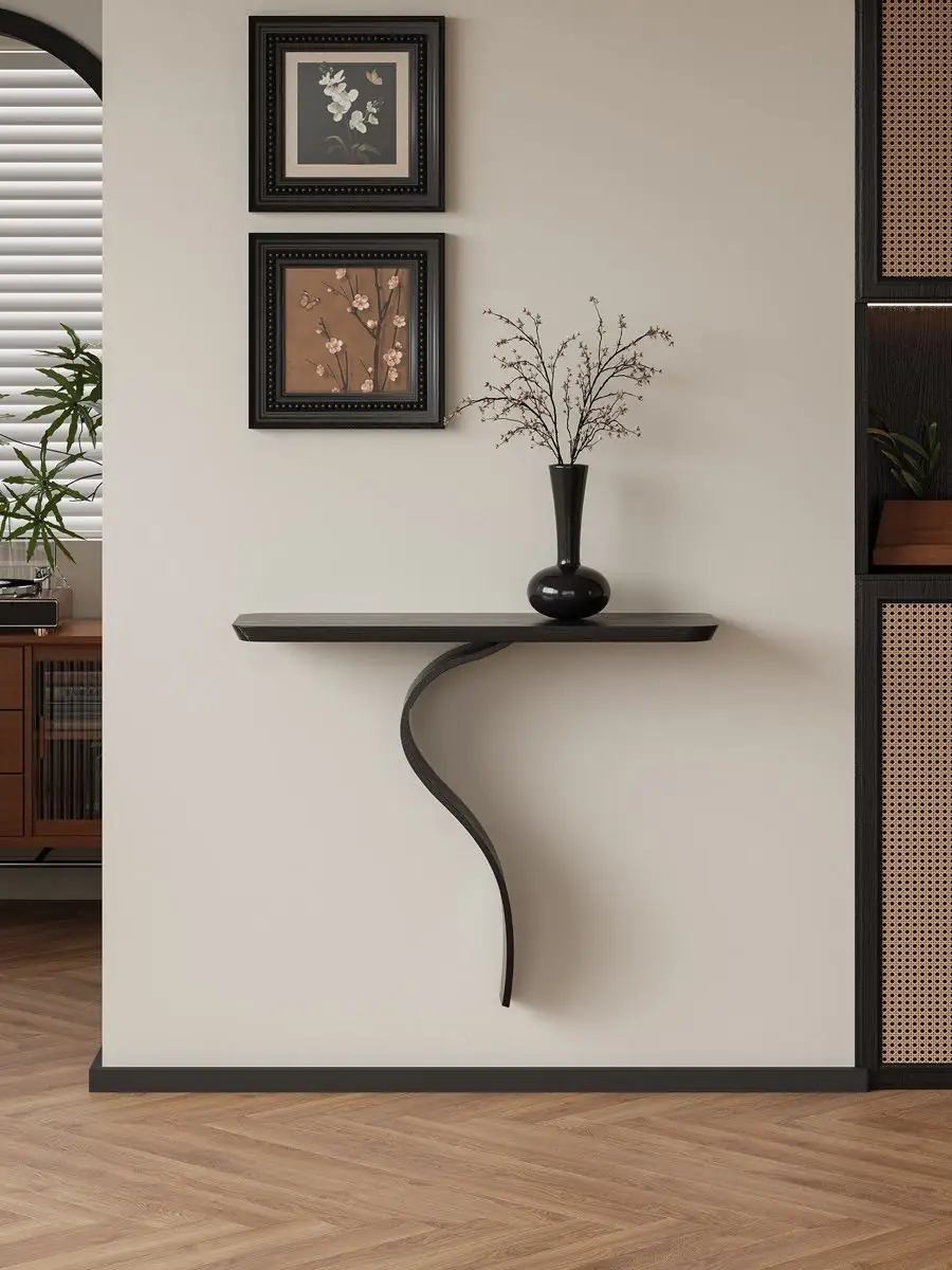 Final lifestyle view of the sculptural S-curve floating wall console