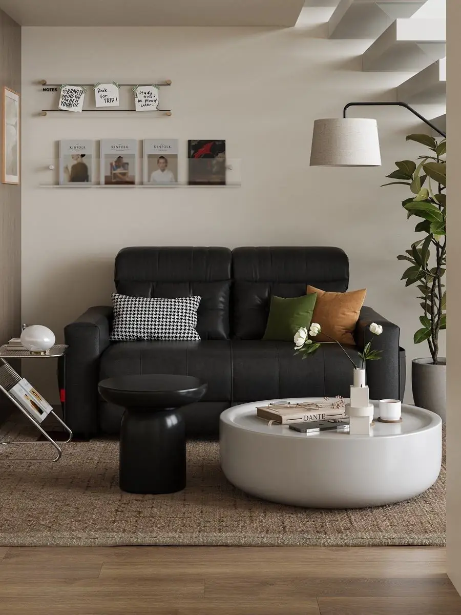 Recliner extended into a shared rest surface beside a floor lamp