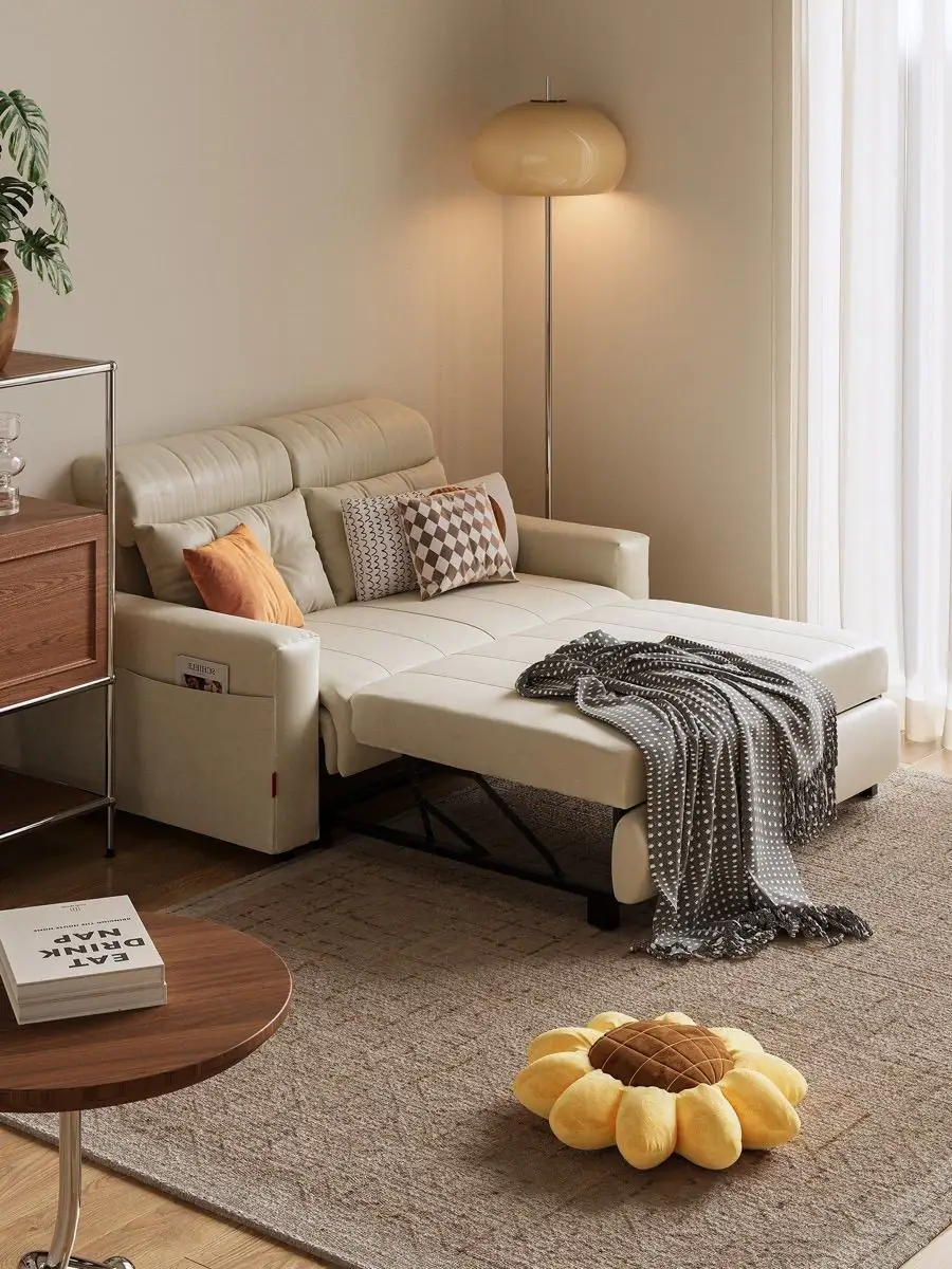 Two-seat recliner staged with timber storage and indoor plants