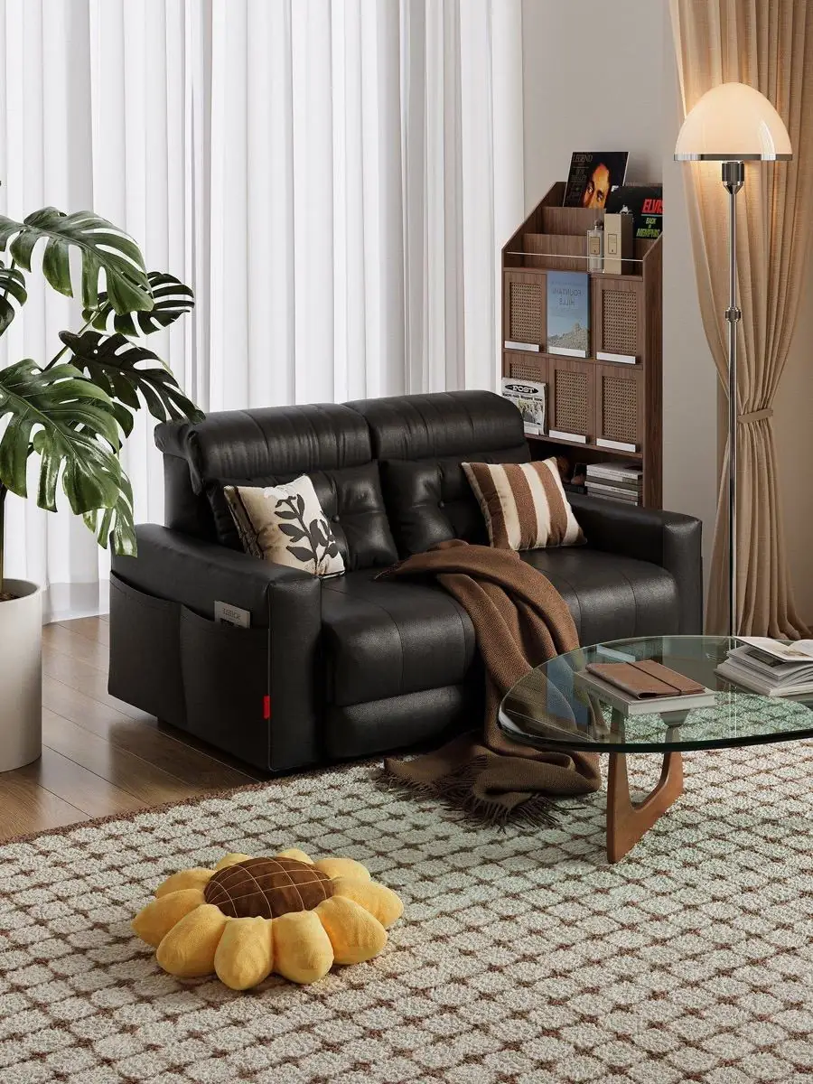Cream recliner extended for resting in a softly lit residential scene