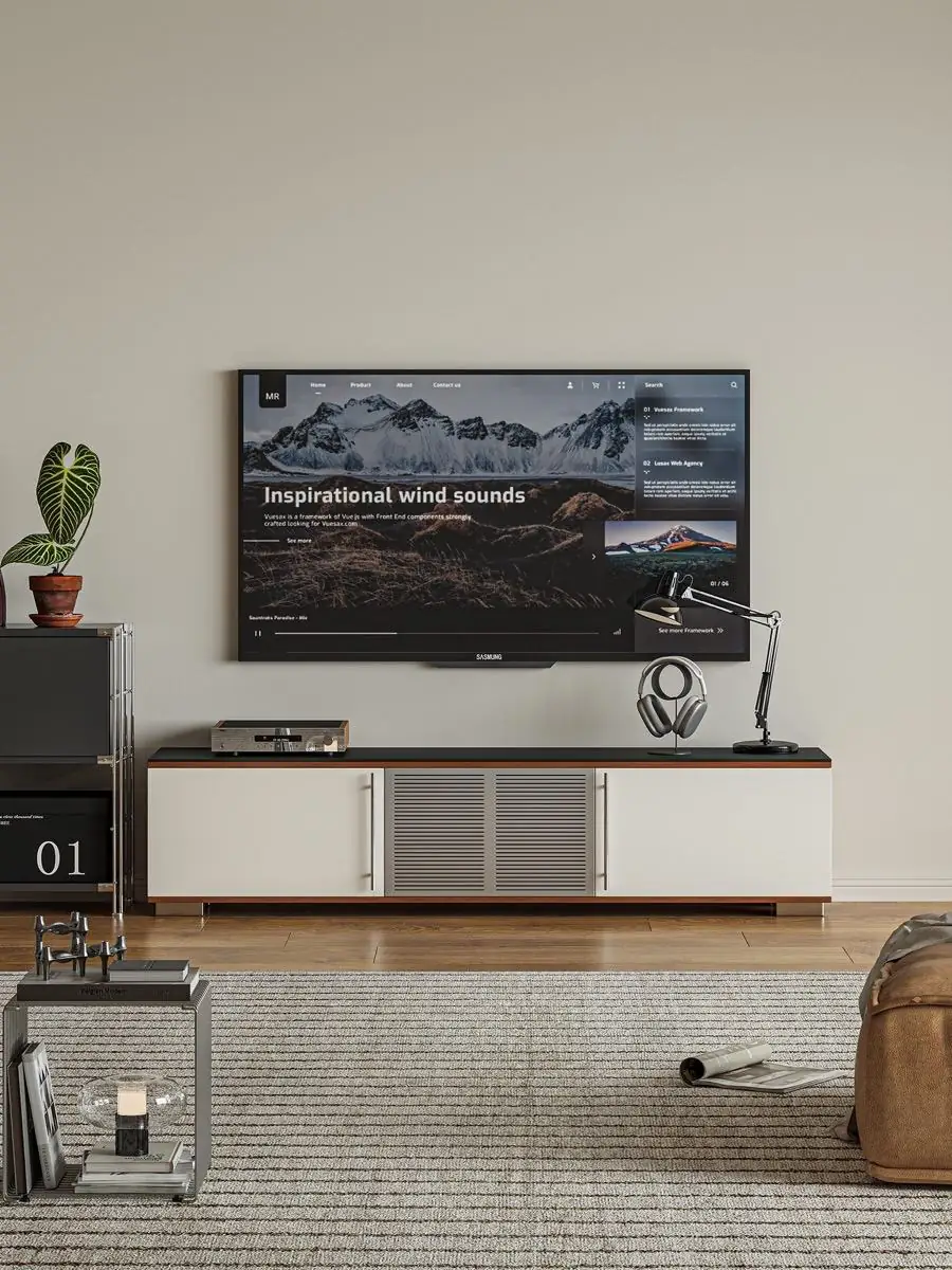 Segmented cream media console with a central grille in a bright living room