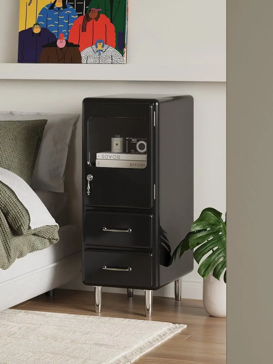 Final lifestyle view of the rounded painted-metal bedside cabinet