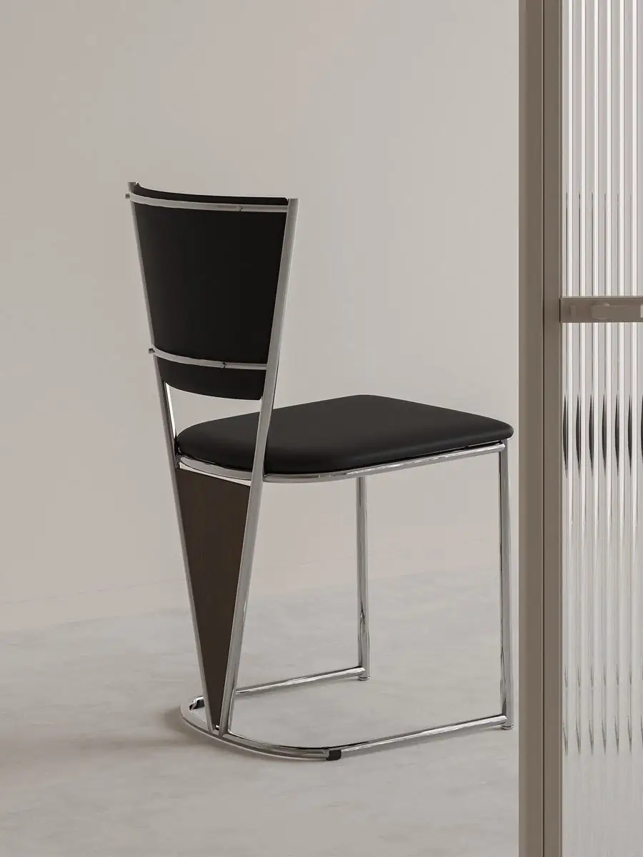 Final lifestyle view of the polished tubular-frame black dining chair