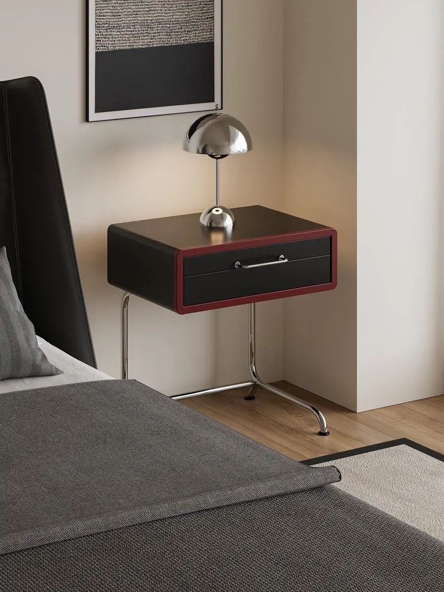 colour-blocked tubular-frame nightstand presented in a styled residential interior