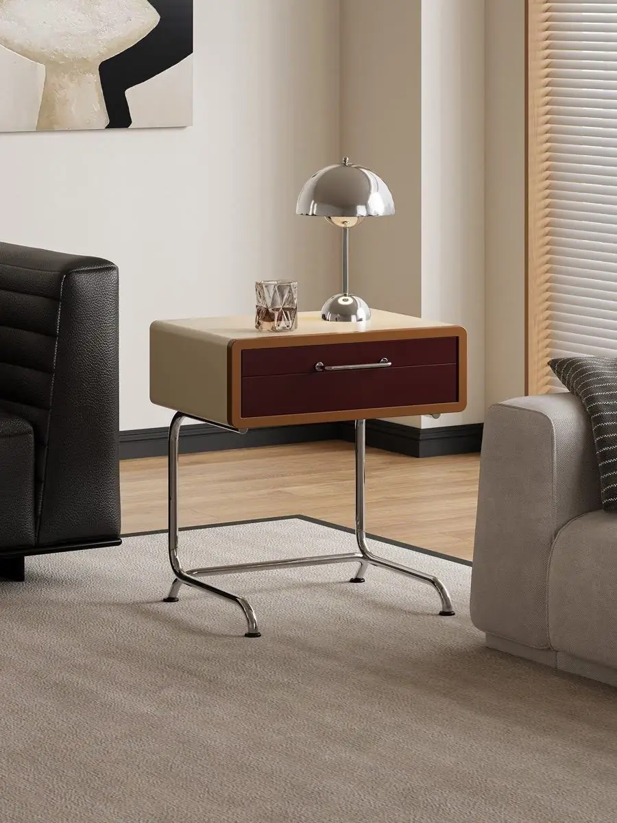 Closer product view of the colour-blocked tubular-frame nightstand