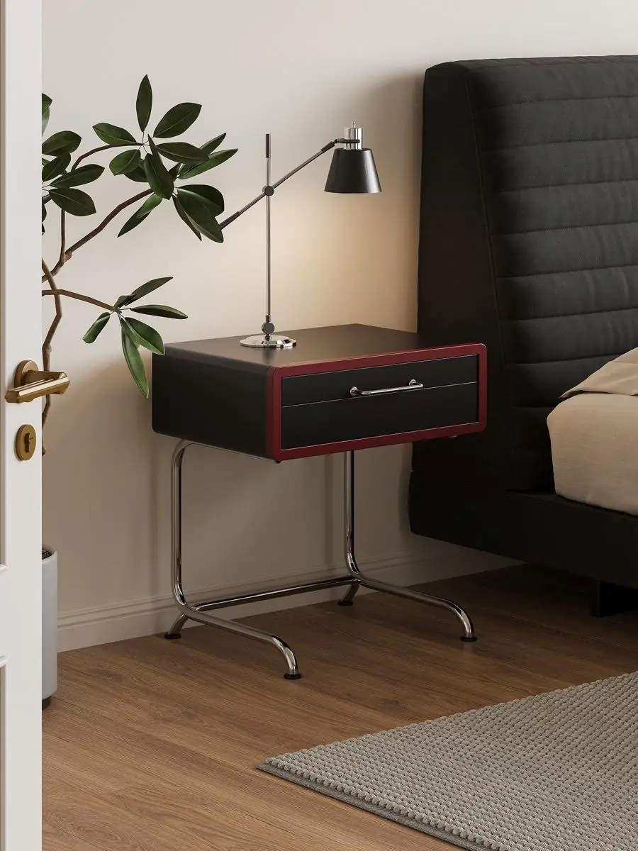 Final lifestyle view of the colour-blocked tubular-frame nightstand