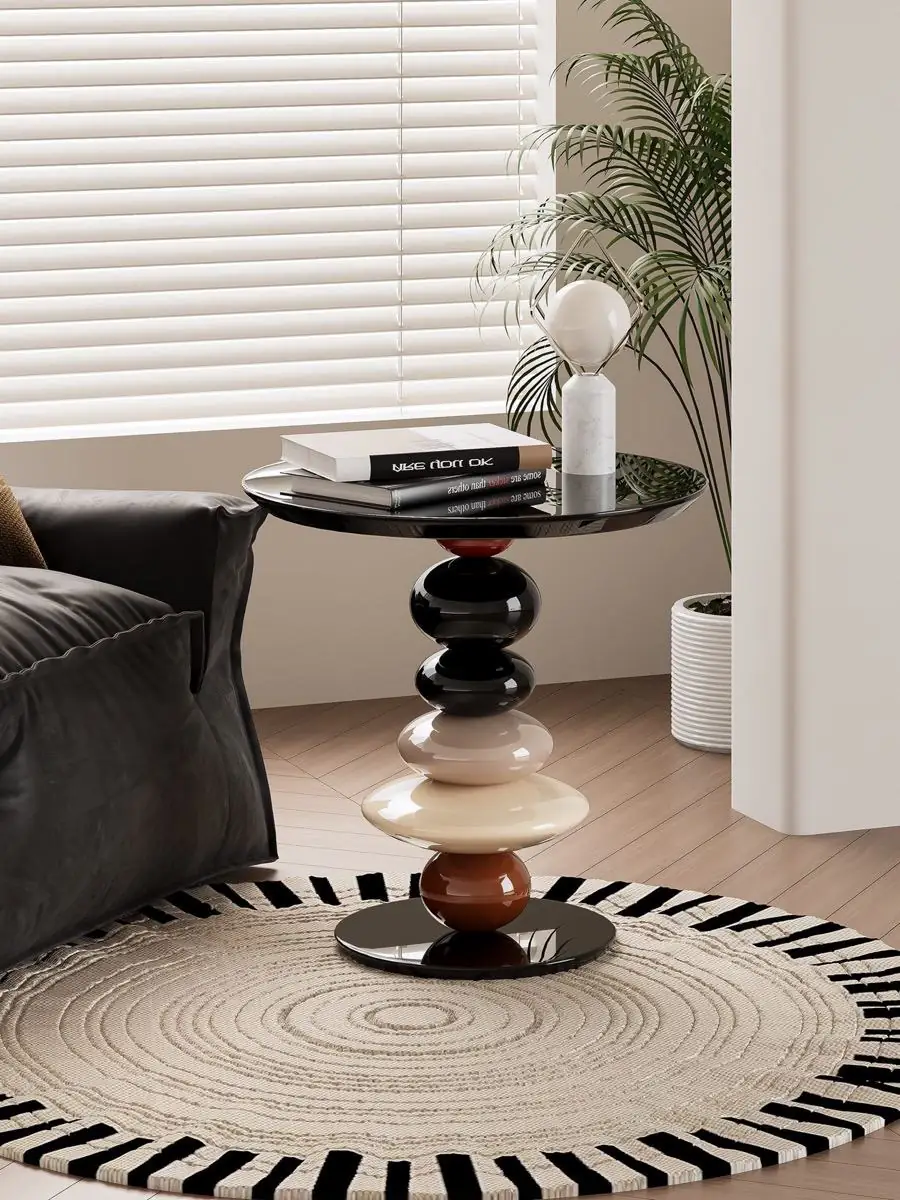 Three-quarter view of the glossy sculpted base