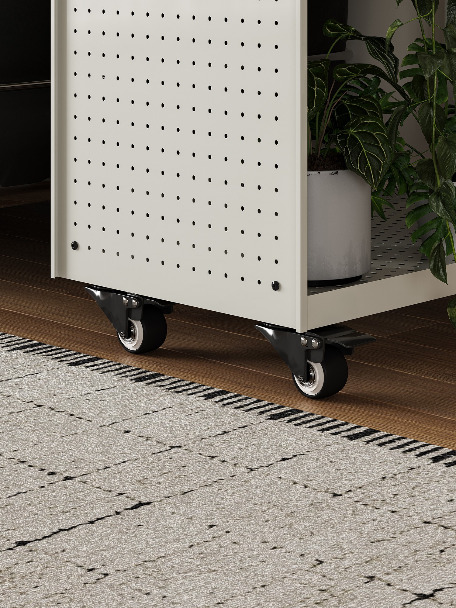Perforated metal shelf detail on the mobile plant trolley