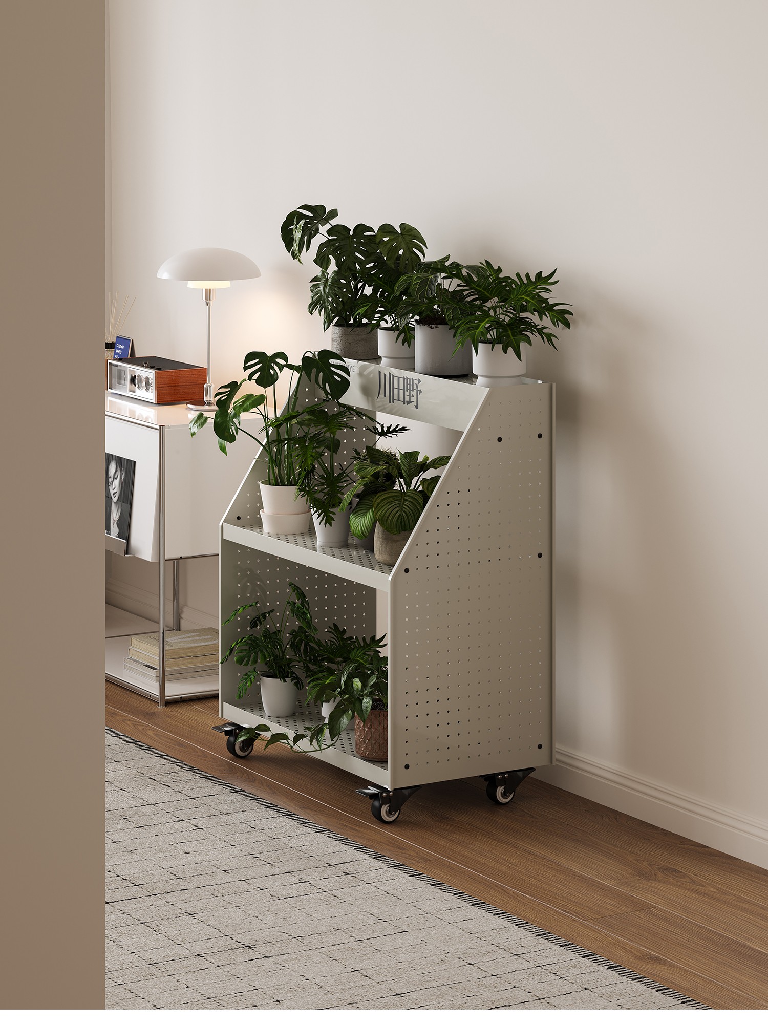 Close view of a potted plant on the perforated trolley shelf