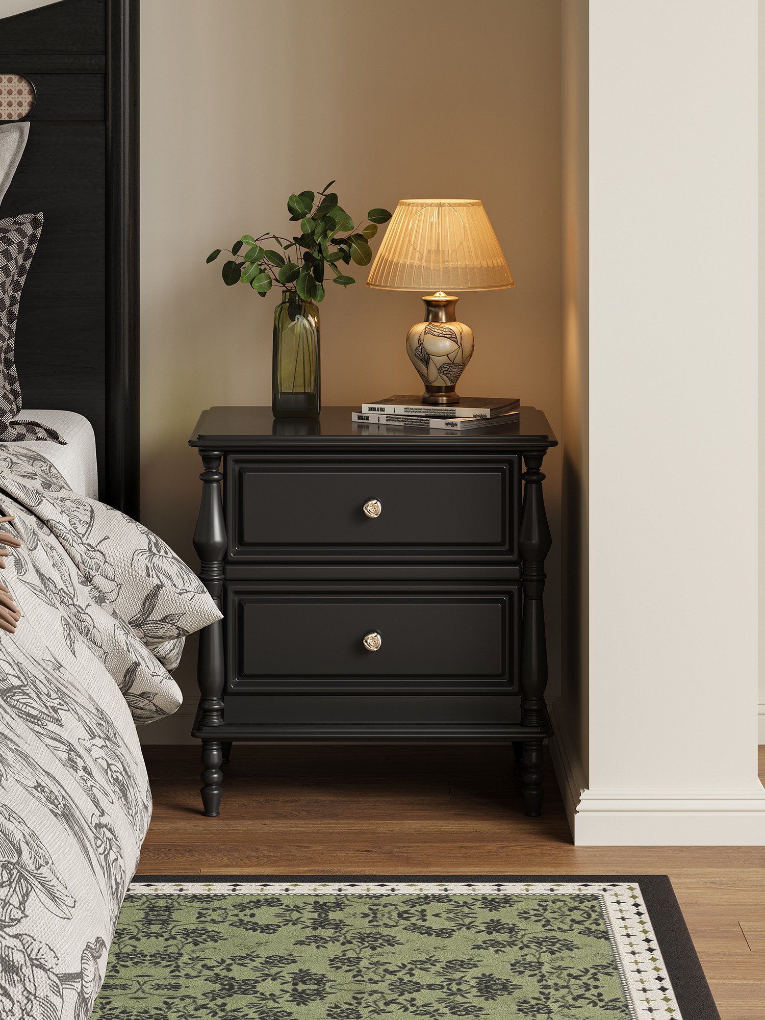 black classical-detail bedside cabinet presented in a styled residential interior