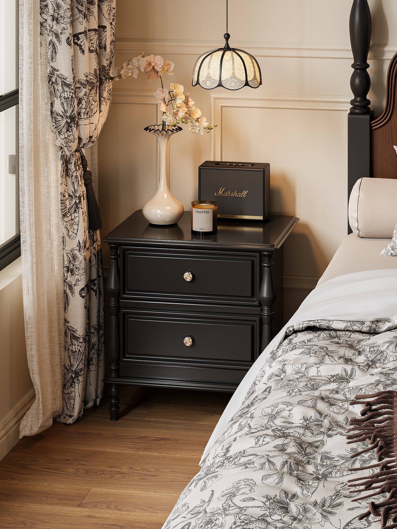 Final lifestyle view of the black classical-detail bedside cabinet