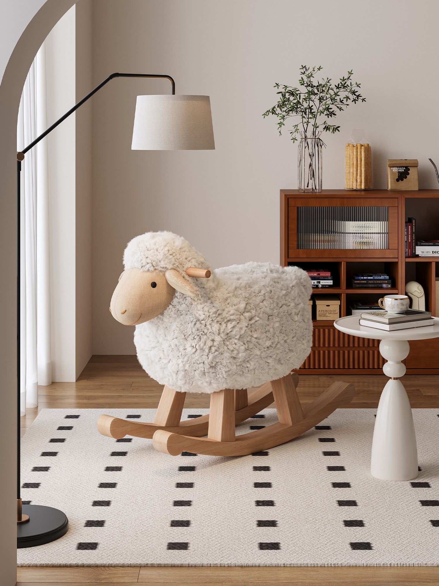 Lamb-shaped rocking chair beside a floor lamp in a warm residential interior