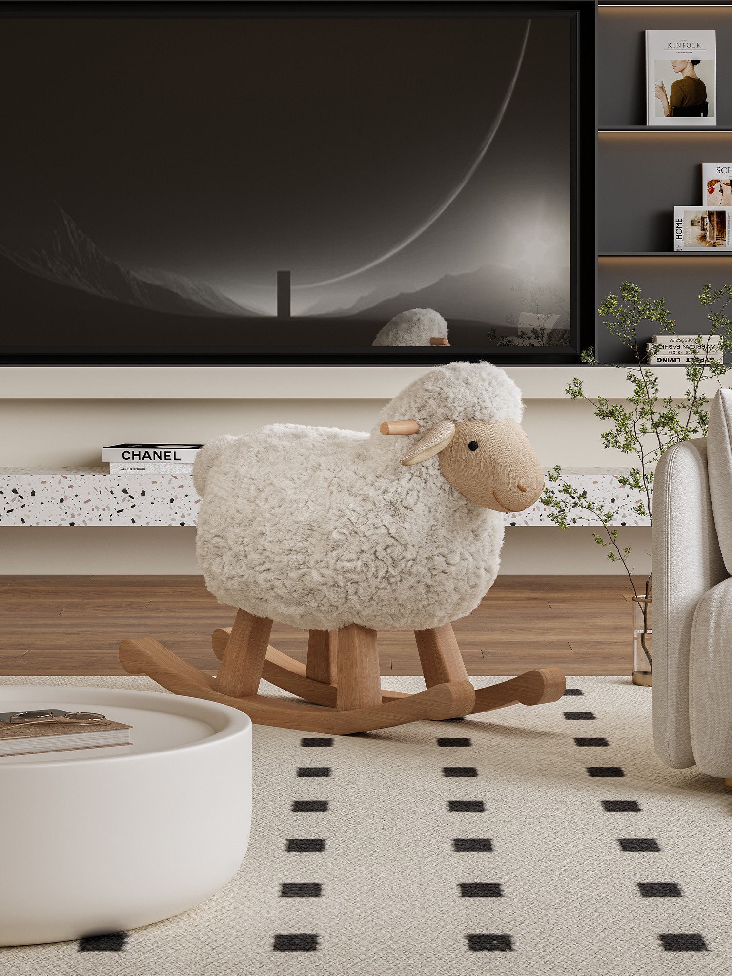 Side view of the rocking chair beside a low table and television wall