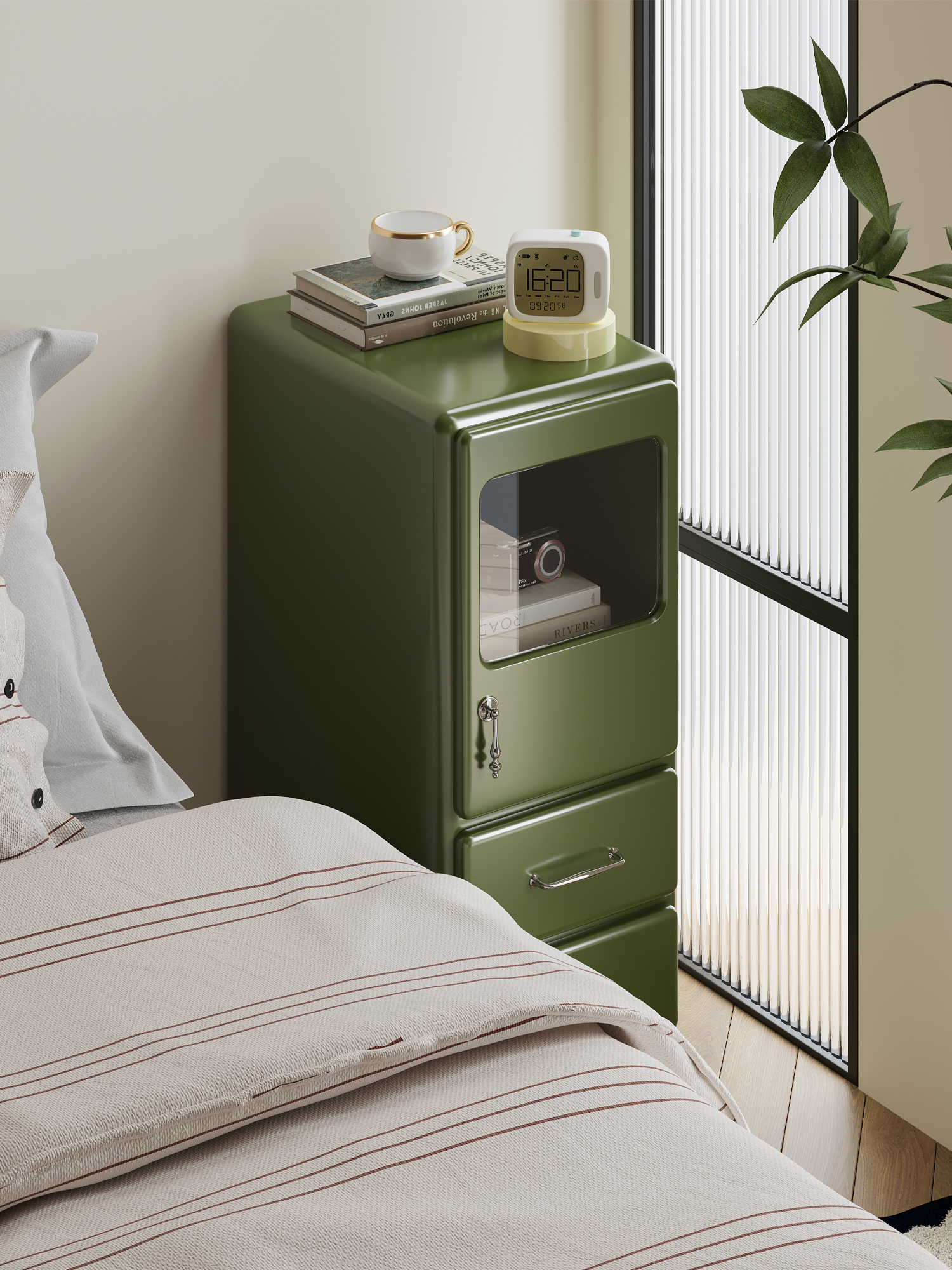 rounded painted-metal bedside cabinet presented in a styled residential interior