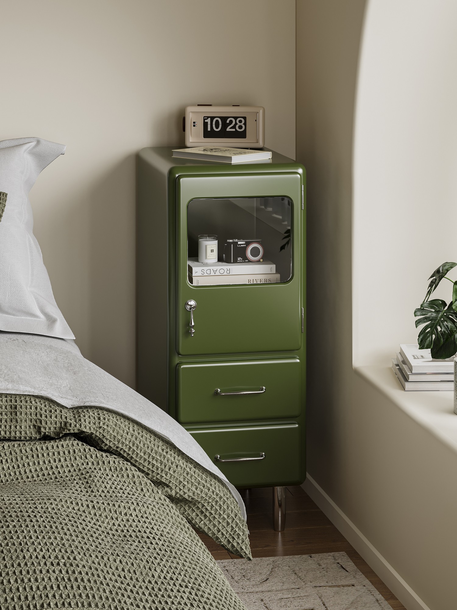 Material and form study of the rounded painted-metal bedside cabinet