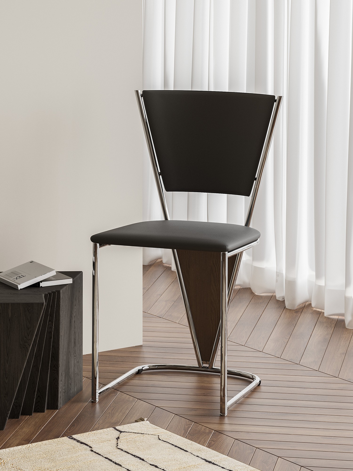 polished tubular-frame black dining chair shown in a second interior setting